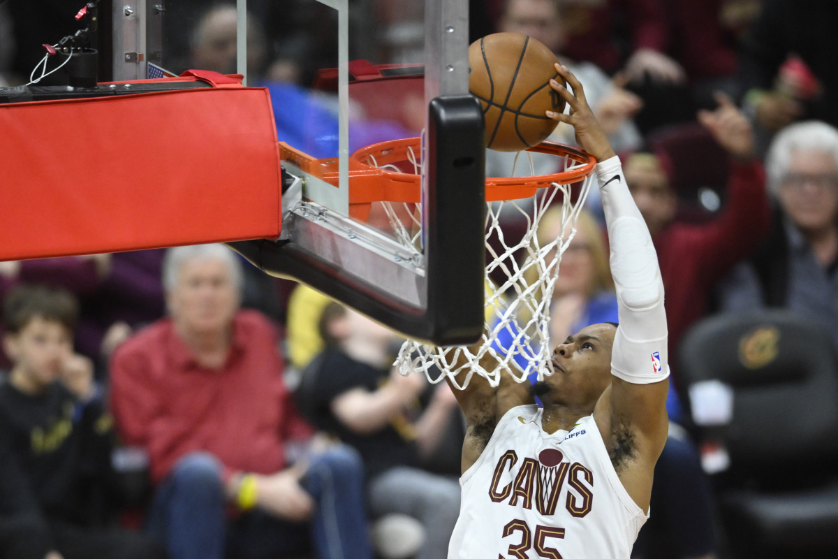 Feb 22, 2024; Cleveland, Ohio, USA; Cleveland Cavaliers forward Isaac Okoro (35) dunks in the fourth quarter against the Orlando Magic at Rocket Mortgage FieldHouse.